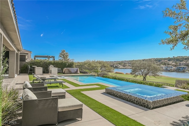 view of swimming pool with a water view, a patio area, and an in ground hot tub