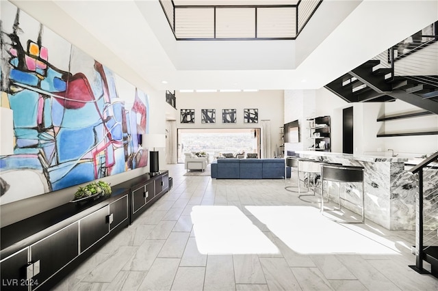 mudroom featuring a high ceiling