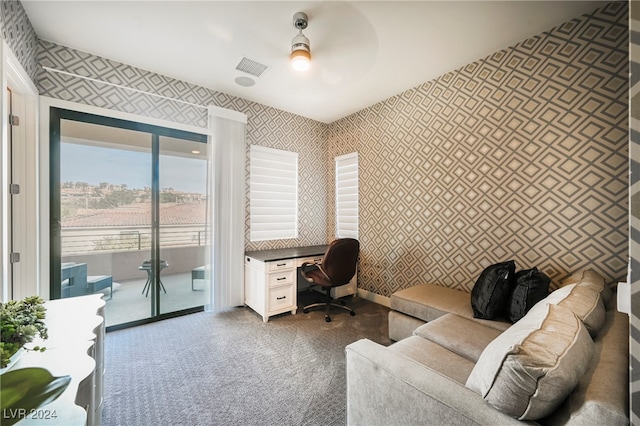 office featuring ceiling fan and carpet