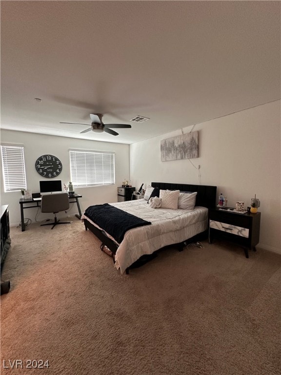 bedroom featuring ceiling fan and carpet flooring