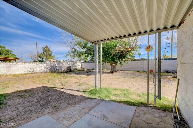 view of yard featuring a patio area and a fenced backyard