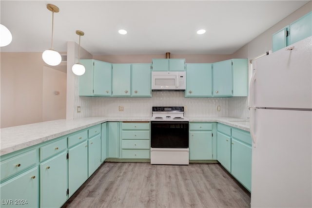 kitchen with white appliances, decorative backsplash, light wood-type flooring, decorative light fixtures, and kitchen peninsula