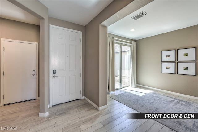 foyer entrance featuring light wood-type flooring