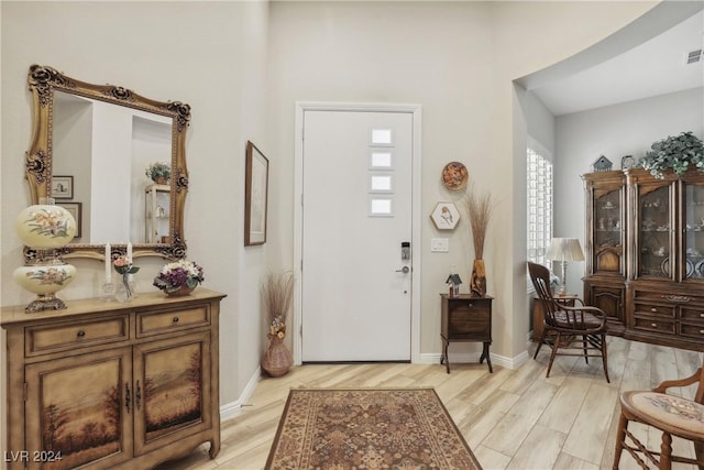 entrance foyer with light hardwood / wood-style floors