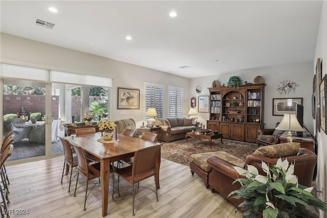 dining area with light hardwood / wood-style flooring