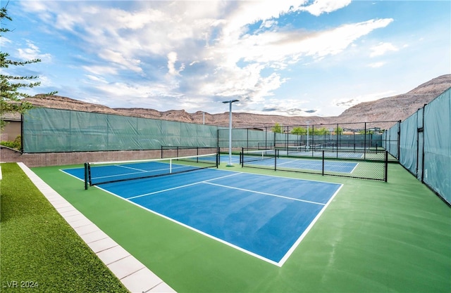 view of sport court featuring a mountain view