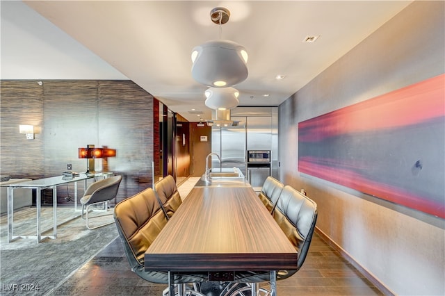 4381 W Flamingo Rd Unit 3021, Las Vegas, NV 89103 - dining area with wood finished floors