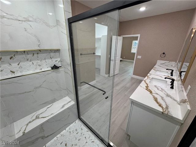 bathroom featuring vanity and walk in shower