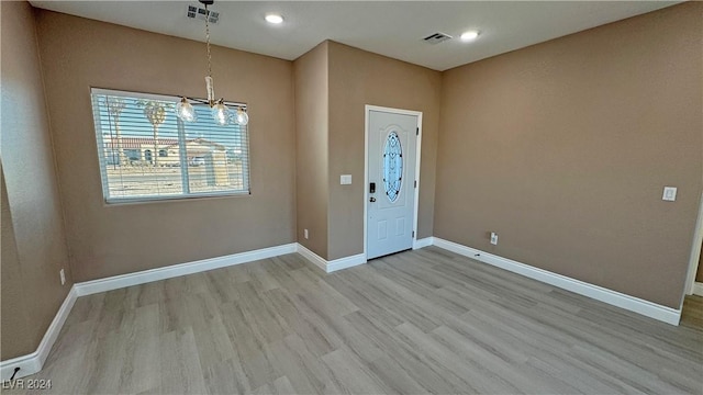 foyer entrance featuring light hardwood / wood-style flooring