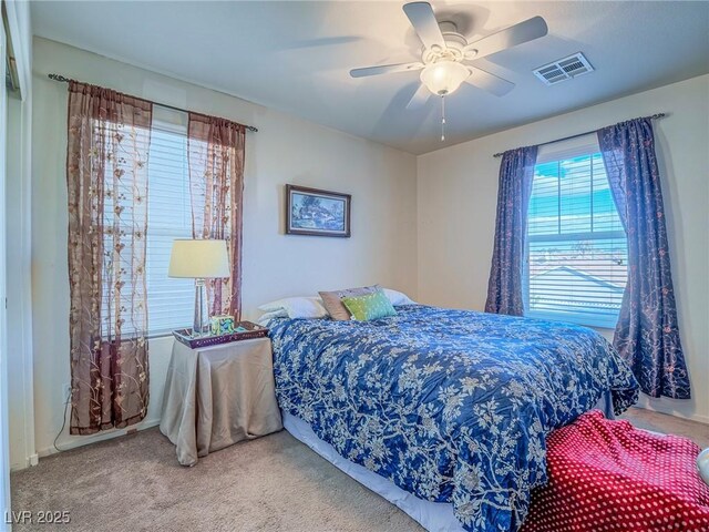 bedroom with carpet flooring and ceiling fan