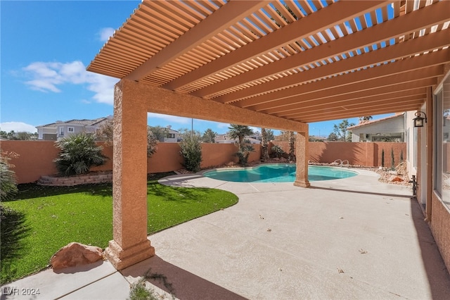 view of patio featuring a pergola and a fenced in pool