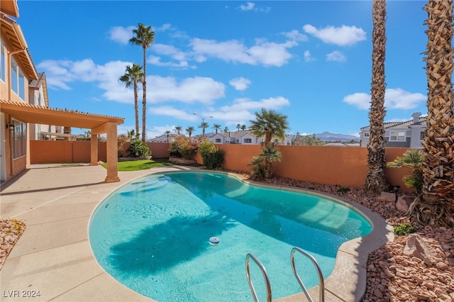 view of pool featuring a pergola and a patio