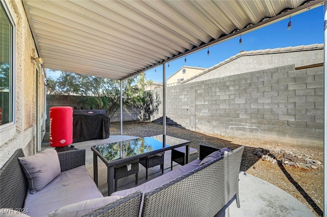 view of patio / terrace with an outdoor living space and grilling area