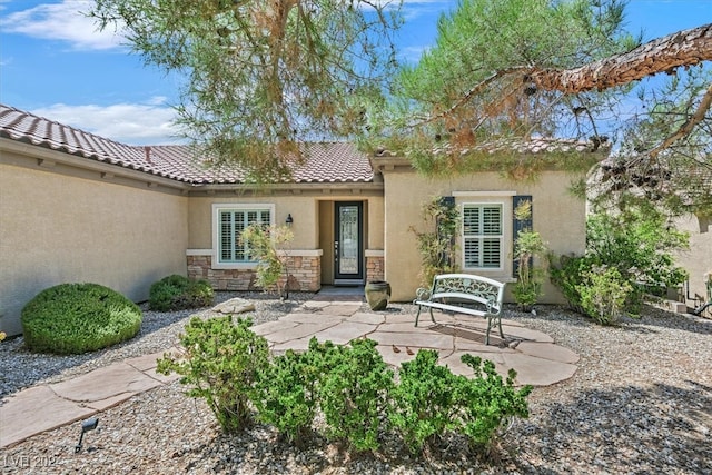 back of property with a patio area