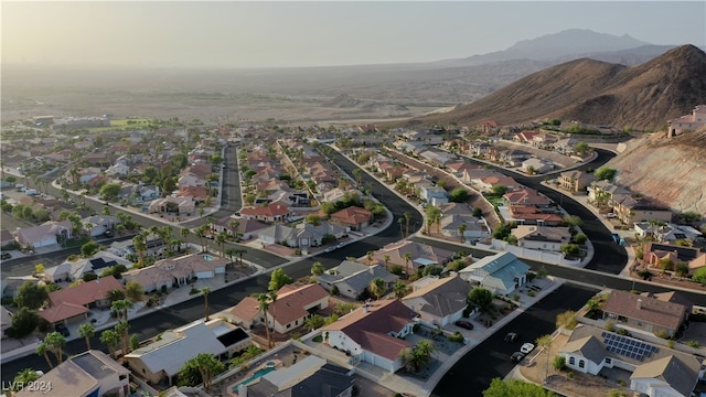 drone / aerial view featuring a mountain view