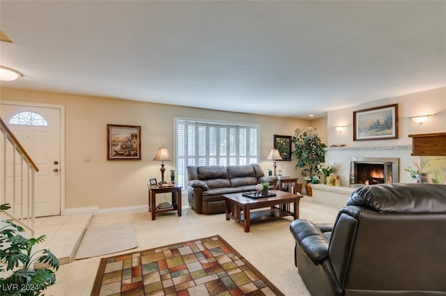 living room featuring light carpet