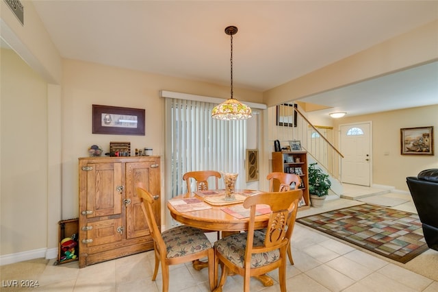 dining room with light tile patterned floors