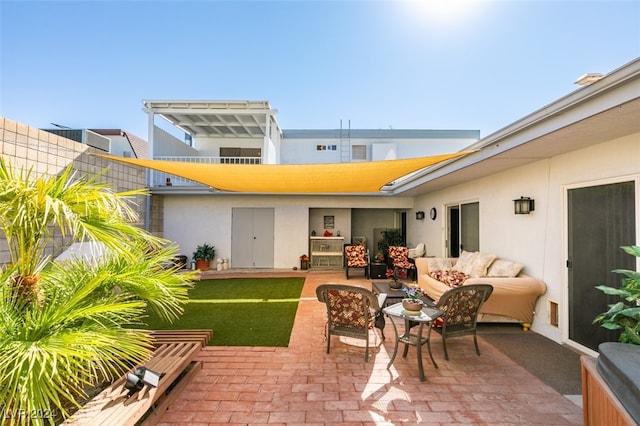 view of patio / terrace with an outdoor hangout area