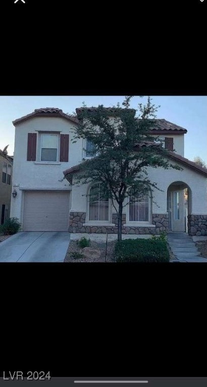 view of front of home featuring a garage