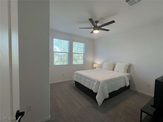 carpeted bedroom with ceiling fan