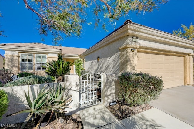 single story home featuring a garage