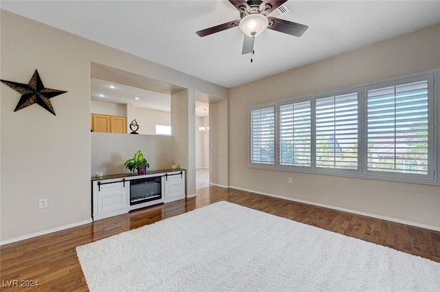 interior space featuring dark hardwood / wood-style floors and ceiling fan