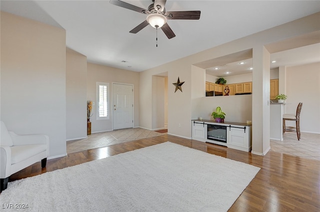 entryway featuring ceiling fan and light hardwood / wood-style flooring