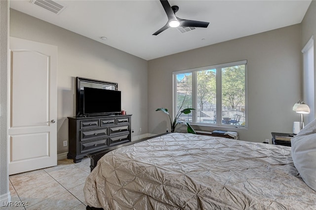 bedroom featuring ceiling fan and light tile patterned floors