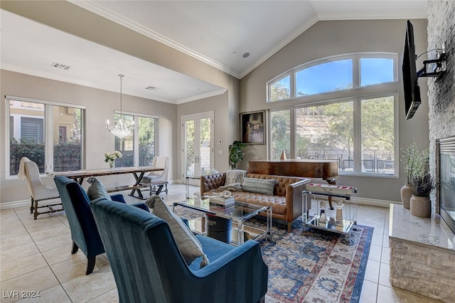 living room featuring an inviting chandelier, light tile patterned floors, crown molding, and plenty of natural light