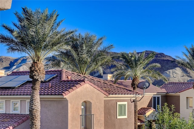 exterior space featuring a mountain view