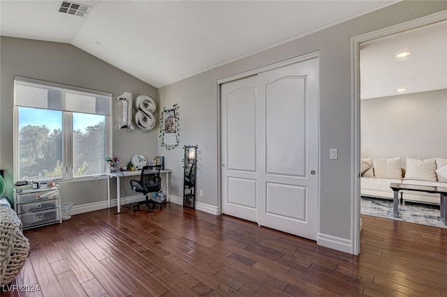 office with dark hardwood / wood-style flooring and lofted ceiling