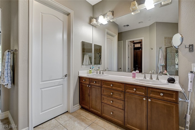 bathroom featuring vanity and tile patterned floors