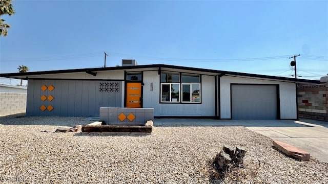 ranch-style home with a garage