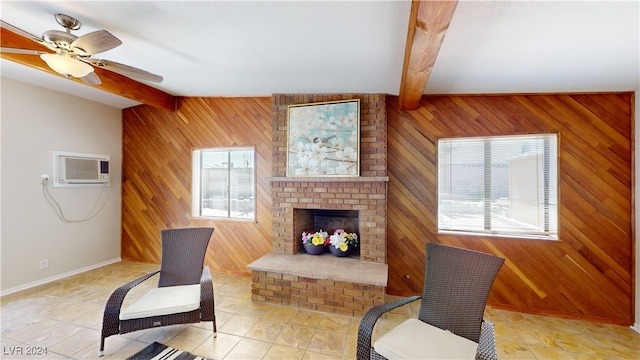 tiled living room with a wealth of natural light, a fireplace, and beamed ceiling