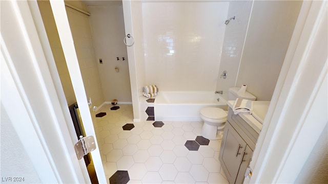 full bathroom featuring vanity, toilet, tile patterned floors, and bathing tub / shower combination