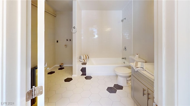 full bathroom featuring vanity, toilet, tiled shower / bath combo, and tile patterned floors