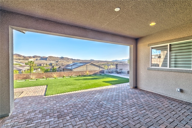 view of patio with a mountain view