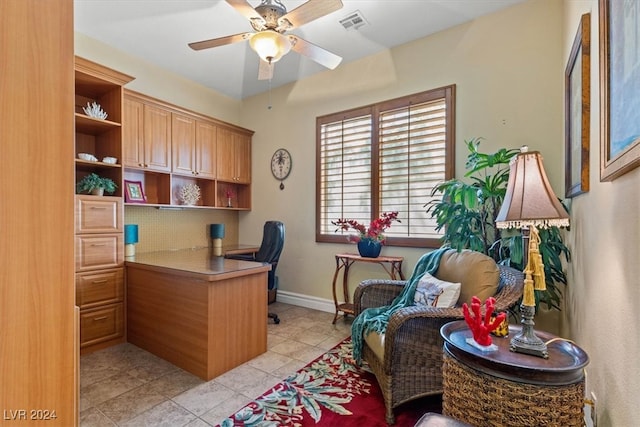 office featuring light tile patterned flooring and ceiling fan