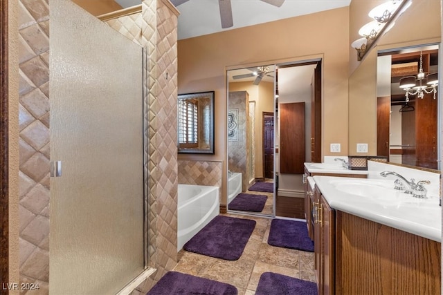 bathroom featuring vanity, ceiling fan, and separate shower and tub