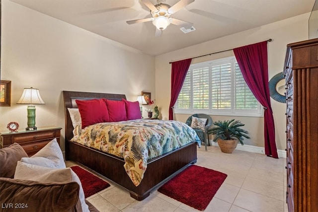 tiled bedroom with ceiling fan