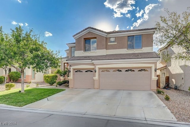 view of property featuring a garage