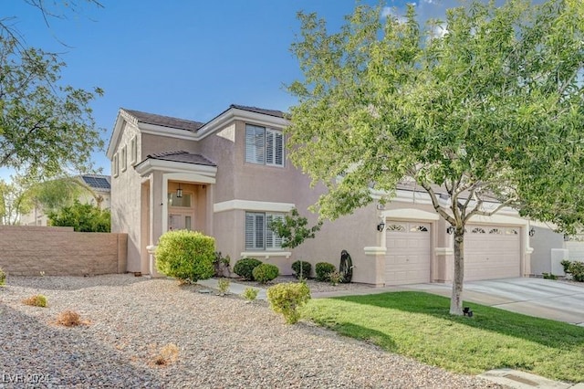 view of front of home with a garage