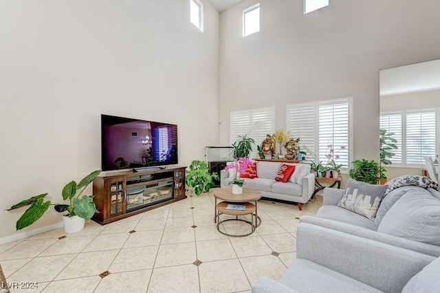 tiled living room with a high ceiling