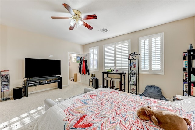 carpeted bedroom featuring ceiling fan