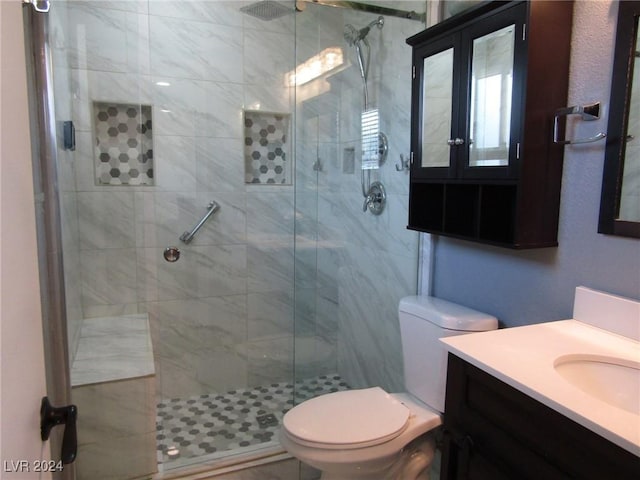 bathroom with vanity, a shower with door, french doors, and toilet