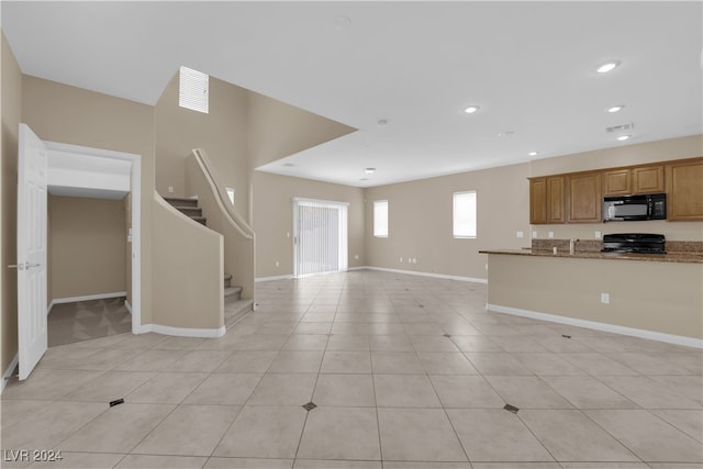 interior space with light tile patterned floors