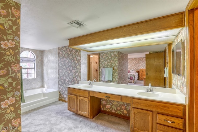 full bathroom with visible vents, a sink, and wallpapered walls