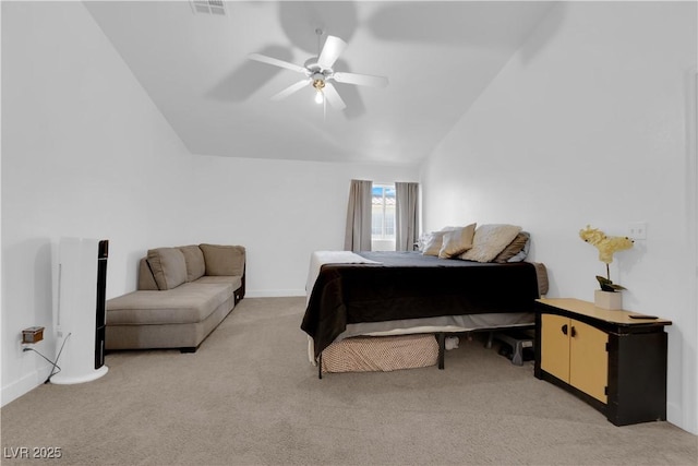 bedroom with vaulted ceiling, light colored carpet, and ceiling fan