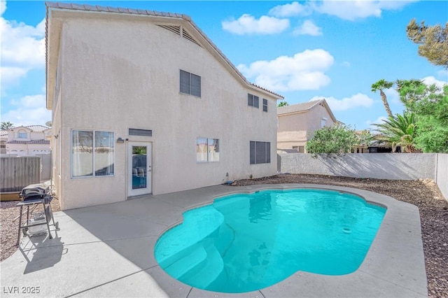 view of pool featuring a patio