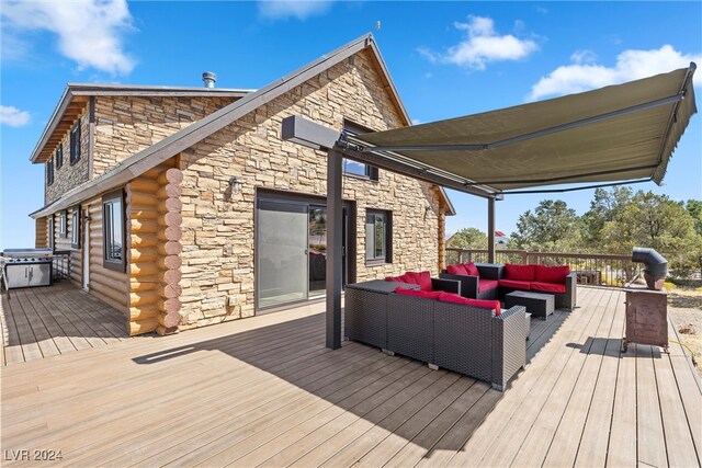 wooden deck with a grill and an outdoor living space